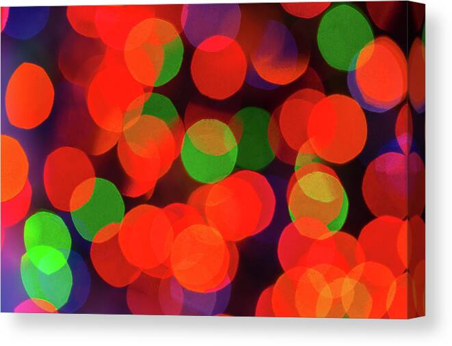 Celebration Canvas Print featuring the photograph Out Of Focus Christmas Lights by Diane Macdonald