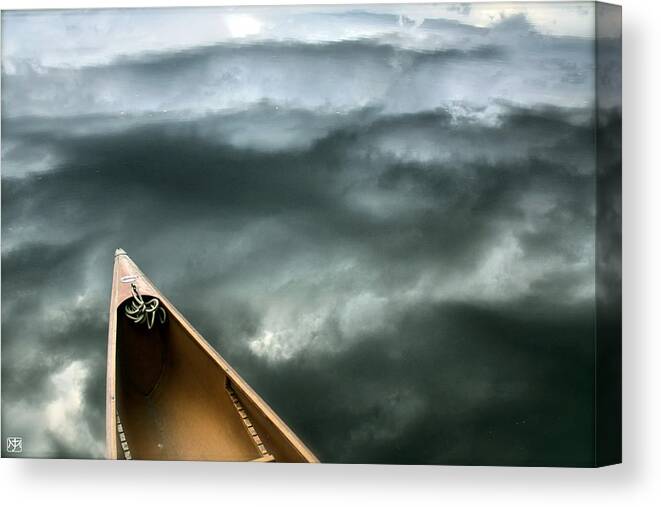 Canoe Canvas Print featuring the photograph Paddling Before the Storm by John Meader