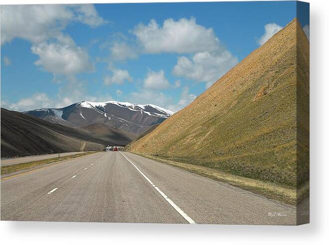 Montana Canvas Print featuring the photograph Just Passin' Thru  by Dyle  Warren