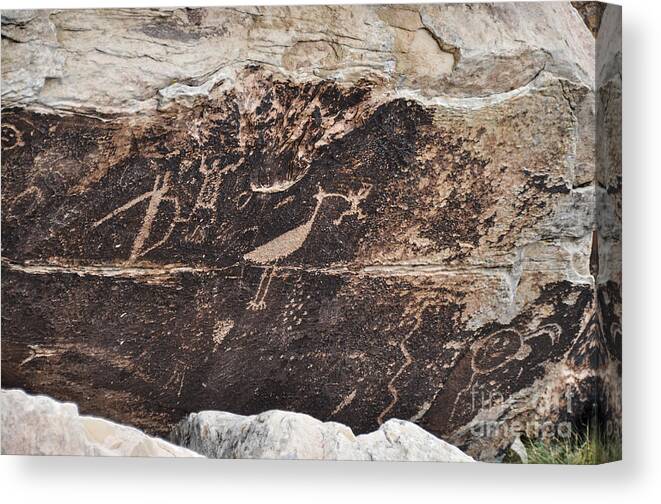 Petroglyphs Canvas Print featuring the photograph Petroglyph Bird by Cheryl McClure