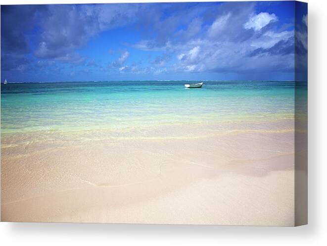 Recreational Pursuit Canvas Print featuring the photograph Photo At The Beach With A Bright Blue by Robertmandel