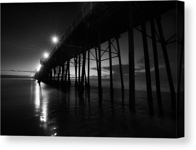 Black & White Canvas Print featuring the photograph Pier Lights - Black and White by Peter Tellone