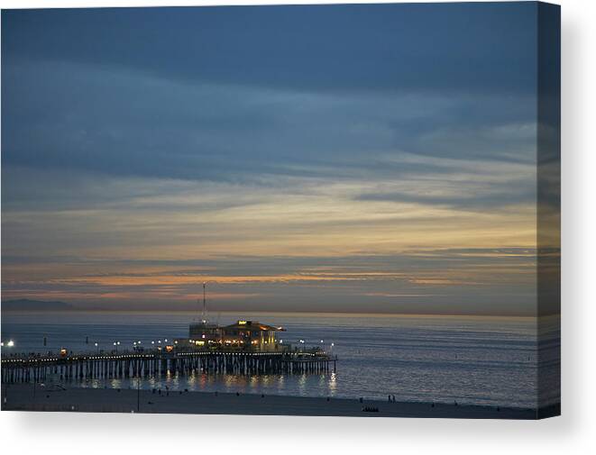 Tranquility Canvas Print featuring the photograph Pier, Ocean And Sky At Dusk by Barry Winiker