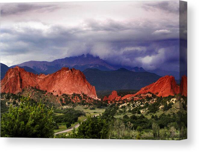 Pikes Peak Photographs Canvas Print featuring the photograph Pikes Peak Storm by Rod Seel