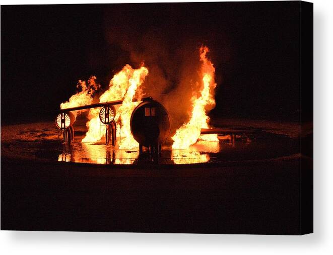 Burning Canvas Print featuring the photograph Plane Heats Up by Aaron Martens