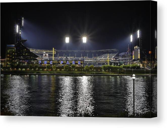 Pnc Park Pittsburgh Pirates Sunset Night Night Time Burgh Baseball Yellow Bridge Canvas Print featuring the photograph PNC at night. by Jimmy Taaffe