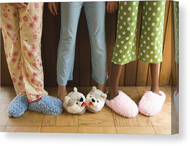 Child Canvas Print featuring the photograph Pre-teen girls wearing fuzzy slippers by Reggie Casagrande