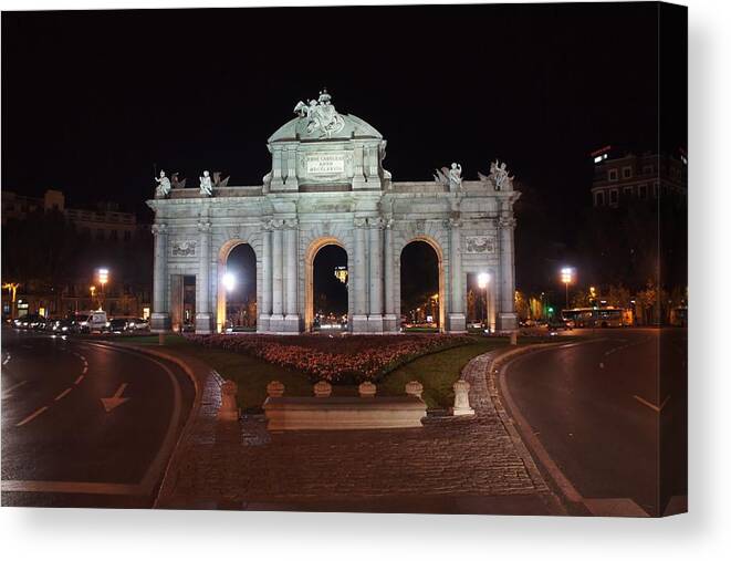 Madrid Canvas Print featuring the photograph Puerta de Alcala at Night by Jenny Hudson