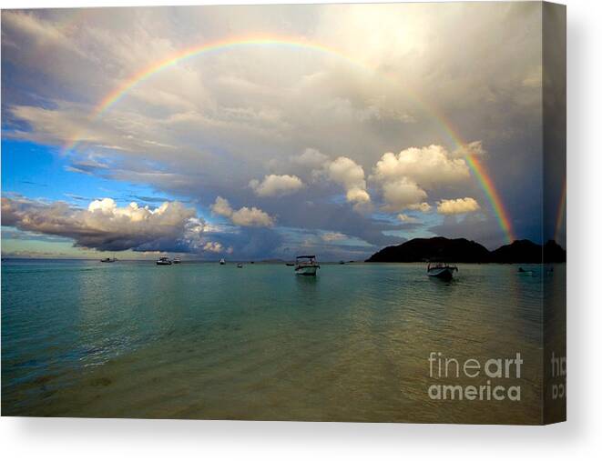 Seychelles Canvas Print featuring the photograph Rainbow In The Seychelles by Tim Holt