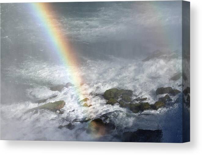 Rainbow Canvas Print featuring the photograph Rainbow on the Rocks by Jackson Pearson