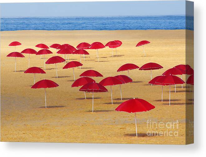 Abstract Canvas Print featuring the photograph Red Umbrellas by Carlos Caetano
