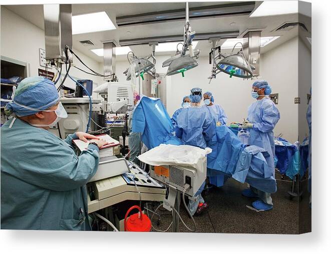 Equipment Canvas Print featuring the photograph Review Prior To Starting Surgery by Jim West