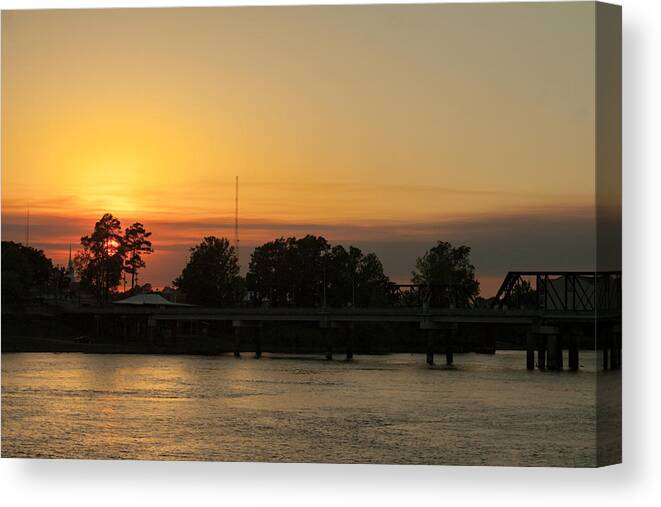 Sunset Canvas Print featuring the photograph RIver Sunset by Eugene Campbell