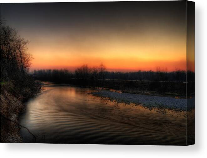 Details Enhancer Canvas Print featuring the photograph Riverscape at sunset by Roberto Pagani