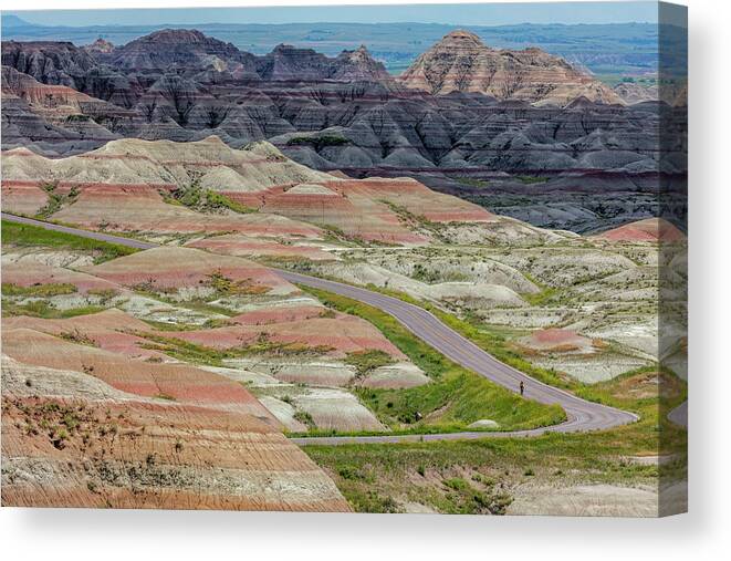 Badland Canvas Print featuring the photograph Road Cycling In Badlands National Park by Chuck Haney