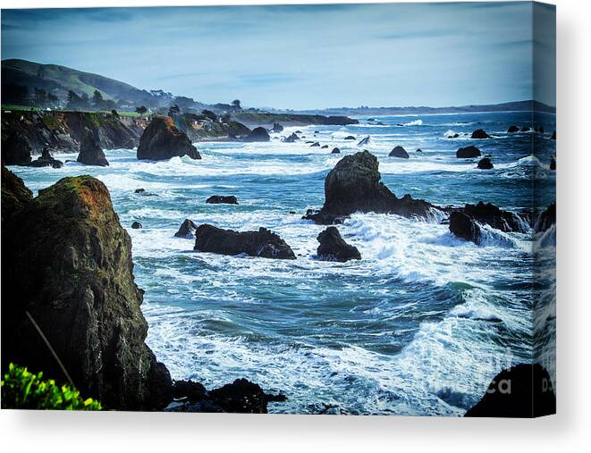 Ocean Canvas Print featuring the photograph Rocks In The Cove by Paul Gillham