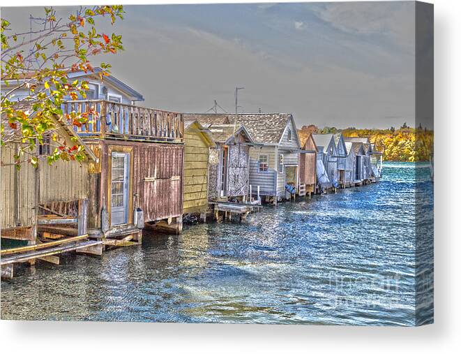 Boathouse Canvas Print featuring the photograph Row of Boathouses by William Norton