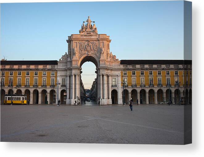 Rua Canvas Print featuring the photograph Rua Augusta Arch at Sunrise in Lisbon by Artur Bogacki
