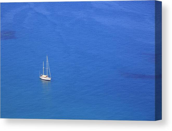 Sicily Canvas Print featuring the photograph Sailing Boat In The Blue Sea by Massimo Pizzotti