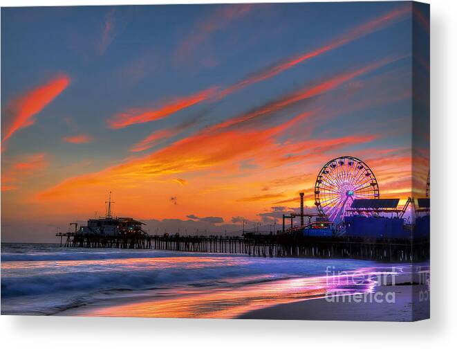 Santa Monica Pier Canvas Print featuring the photograph Santa Monica Pier at Dusk by Eddie Yerkish