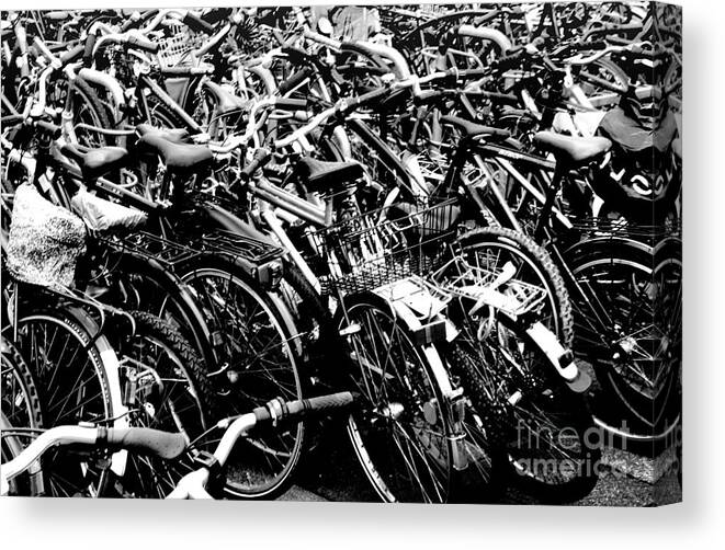 Bikes Canvas Print featuring the photograph Sea of Bicycles 2 by Joey Agbayani