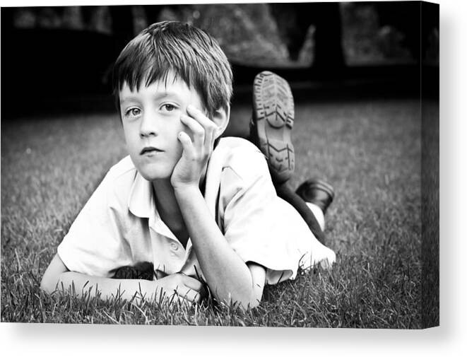 Anger Canvas Print featuring the photograph Serious child by Tom Gowanlock