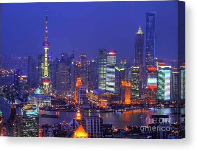 Shanghai Canvas Print featuring the photograph Shanghai's Skyline by Lars Ruecker