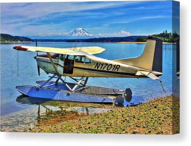 Mount Rainier Canvas Print featuring the photograph She Sees Sea Planes at the Sea Shore by Benjamin Yeager