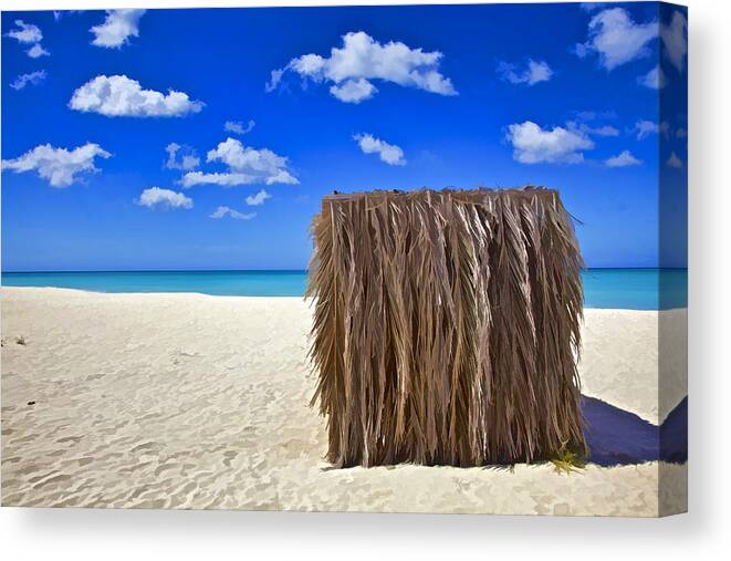 Aruba Canvas Print featuring the photograph Shelter on a White Sandy Caribbean Beach with a Blue Sky and White Clouds II by David Letts