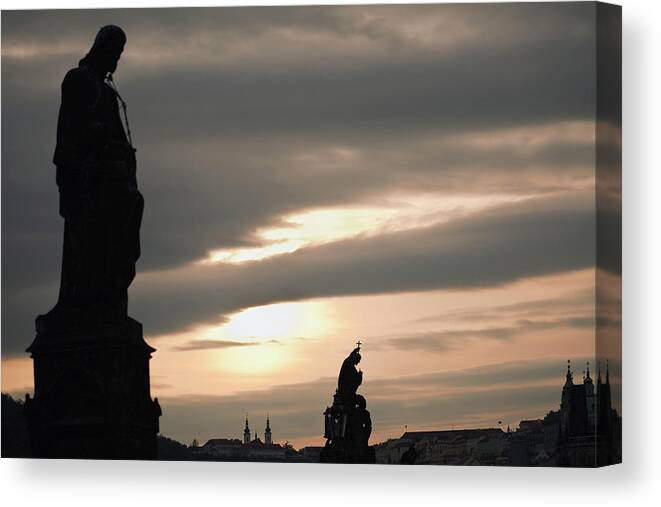 Art Canvas Print featuring the photograph Silhouette Of Statues And Buildings At by Terence Waeland / Design Pics