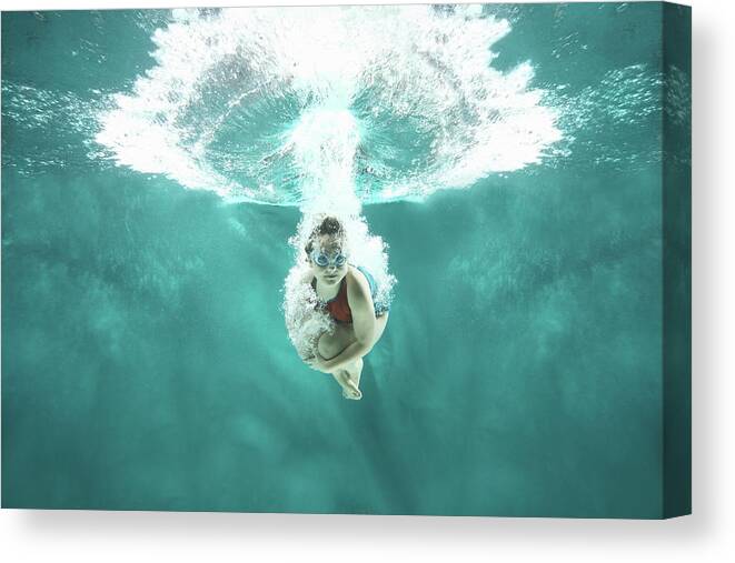 Underwater Canvas Print featuring the photograph Small Girl Jumping Into The Water- by Stanislaw Pytel