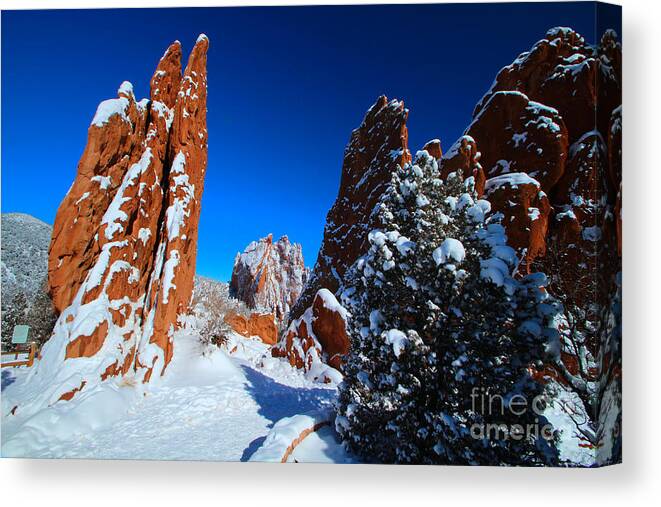 Winter Canvas Print featuring the photograph Snow on Vertical Rock Formations at Garden of the Gods by JD Smith