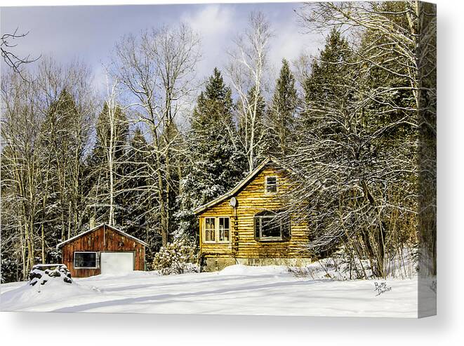Snow Canvas Print featuring the photograph Snowy Log Home by Betty Denise