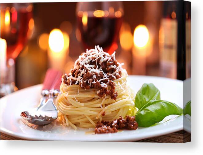 Cheese Canvas Print featuring the photograph Spaghetti bolognese with parmesan cheese by Moncherie