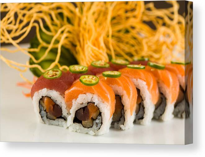 Asian Canvas Print featuring the photograph Spicy Tuna and Salmon Roll by Raul Rodriguez
