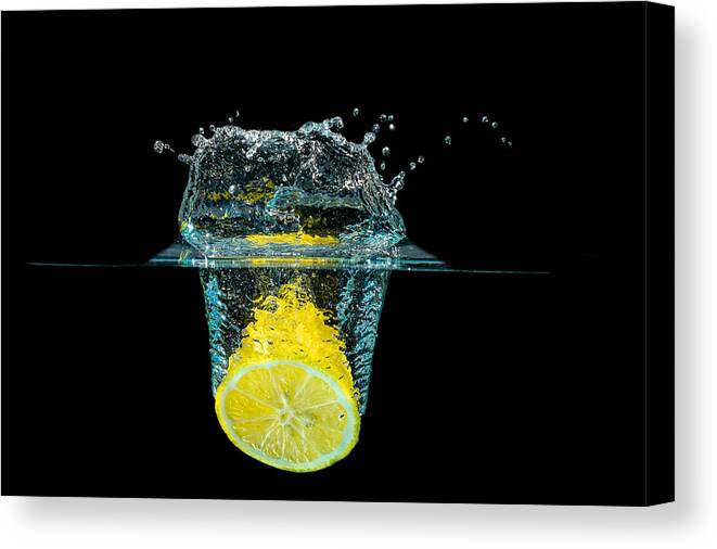 Beverage Canvas Print featuring the photograph Splashing Lemon by Peter Lakomy