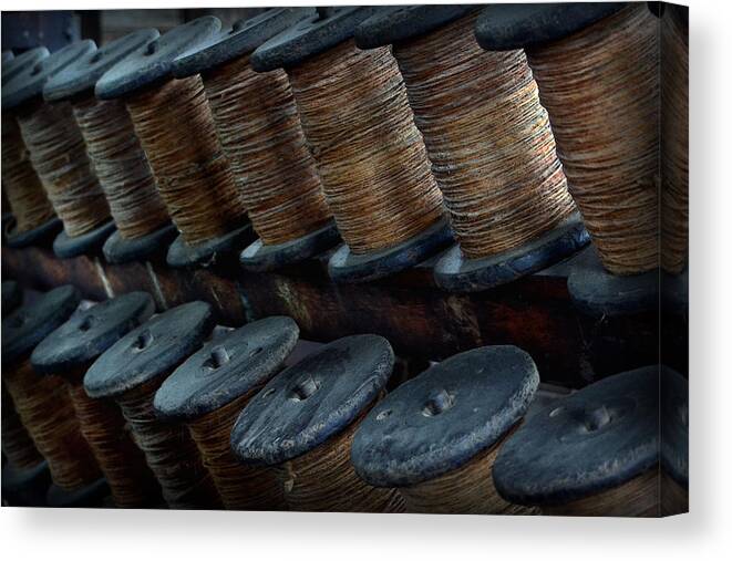Spools Canvas Print featuring the photograph Spools in a Row by Nadalyn Larsen