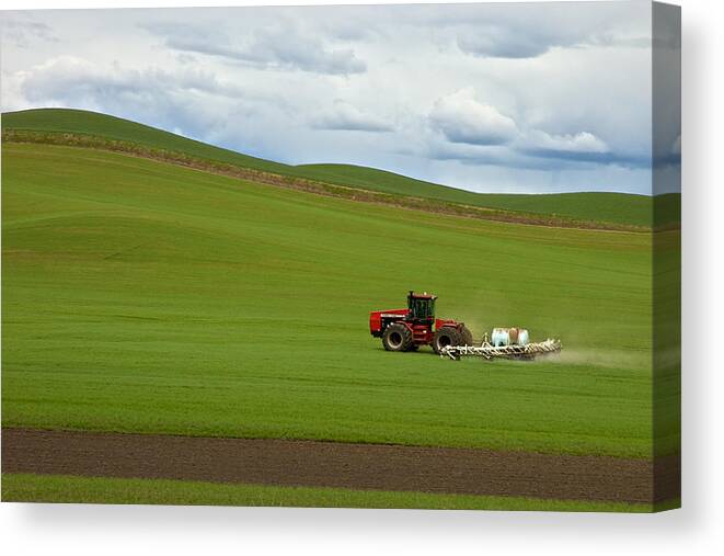Agriculture Canvas Print featuring the photograph Spraying the Fields by Mary Lee Dereske
