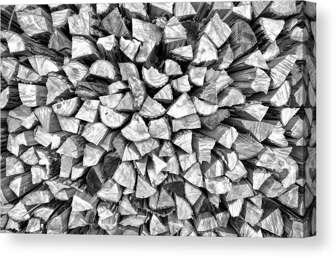 Abstract Canvas Print featuring the photograph Stacked Firewood by David Letts