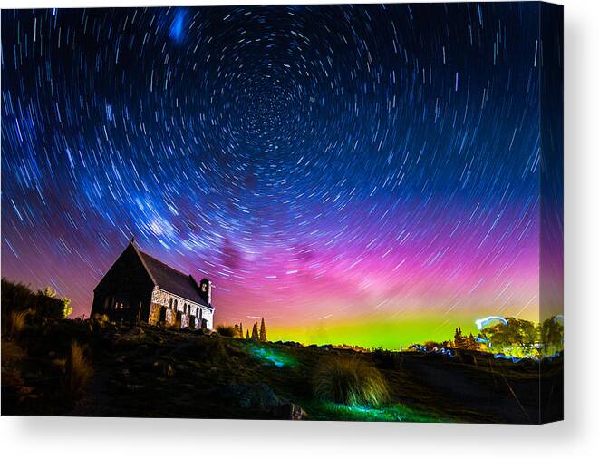 Aurora Australis Canvas Print featuring the photograph Star trails and Aurora light at Church of the Good Shepherd by Rattapon Wannaphat