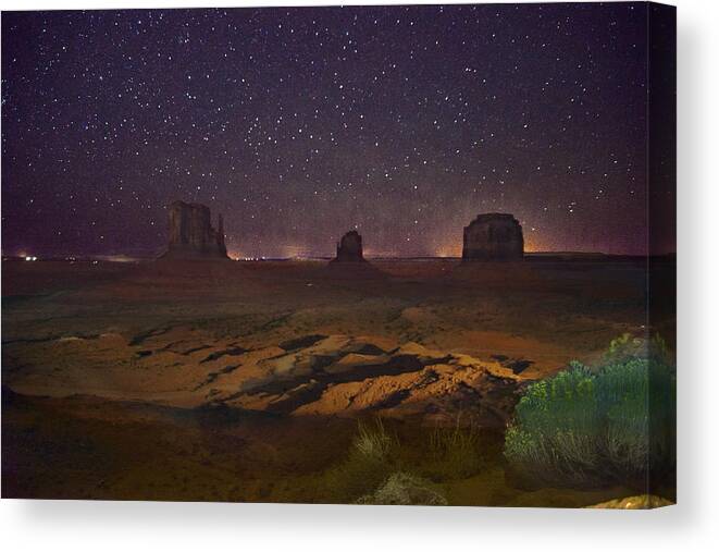 Monument Valley Canvas Print featuring the photograph Stars Over Monument Valley by Steven Barrows