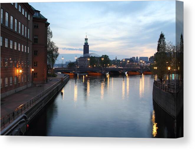 Sweden Canvas Print featuring the photograph Stockholm Vasabron and the city hall by night by Pejft