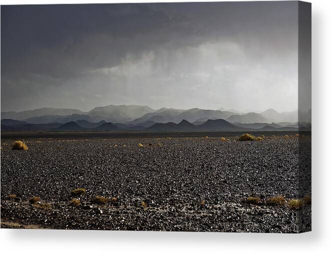 Scenics Canvas Print featuring the photograph Storm In Moroccan Desert Africa by Pavliha