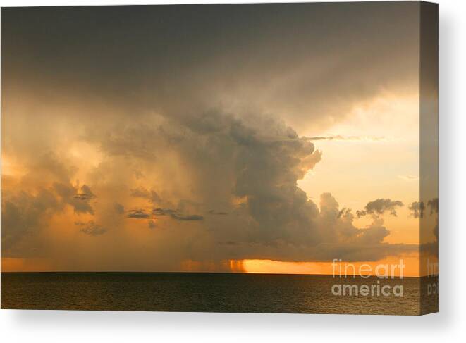 Storm Canvas Print featuring the photograph Stormy Sunset by Mariarosa Rockefeller