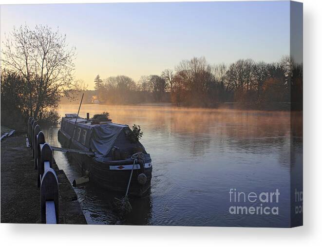 Sunrise At Hampton Court England Uk River Thames Boat Barge Canal House Houseboat Britain British English Landscape Countryside Uk United Kingdom Tranquil Calm Water Mist Misty Fog Foggy Hazy Steam Canvas Print featuring the photograph Sunrise on the Thames by Julia Gavin