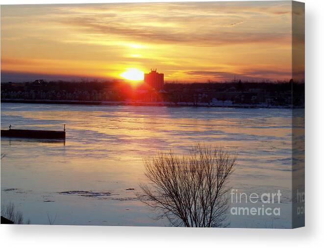 Sunrise On A Cold Frozen Niagara River Canvas Print featuring the photograph Sunrise On A Cold Frozen Niagara River by John Telfer