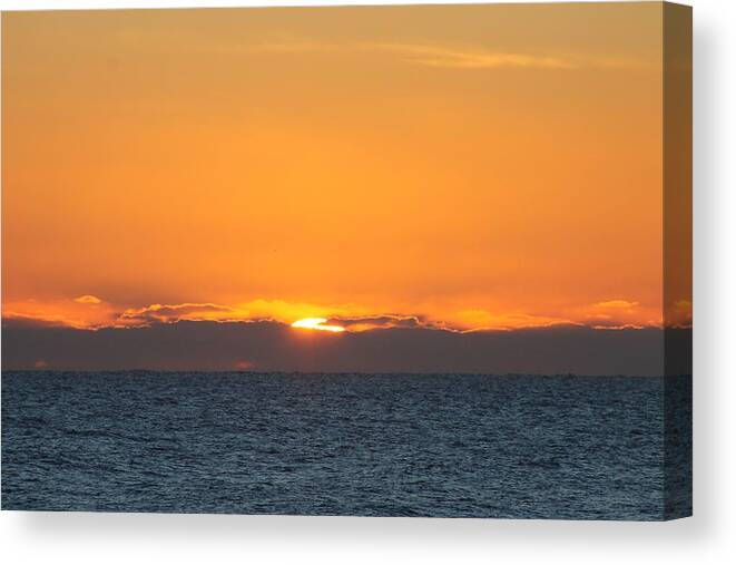 Nature Canvas Print featuring the photograph Sunrise Over A Cloudy Horizon by Robert Banach