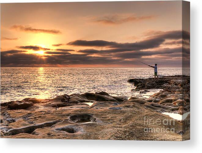 Sunset Canvas Print featuring the photograph Sunset Fisherman by Eddie Yerkish