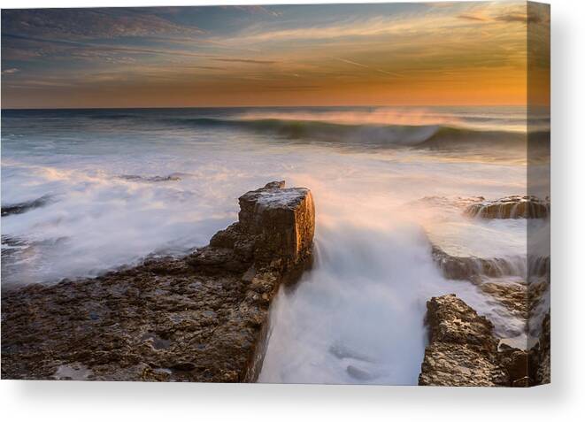 Sea Canvas Print featuring the photograph Sunset Over A Rough Sea II by Marco Oliveira
