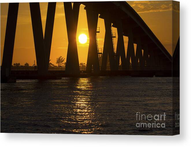 Sunset Canvas Print featuring the photograph Sunset over Sanibel Island Photo by Meg Rousher